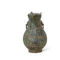 An archaic bronze ritual wine vessel and cover, hu, Spring and Autumn period (771-476 BC)