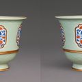 A pair of large moulded celadon-glazed underglaze-blue and iron-red decorated jardinières, seal marks and period of Qianlong (17