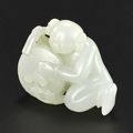 A white jade 'Boy and Drum' carving, Qing dynasty, 18th century