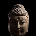 A fine large and rare stone head of Buddha Shakyamuni, Tang dynasty (618-907)