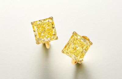 An important pair of coloured diamond earclips, Carvin French