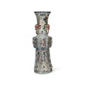 A large wucai 'dragon and phoenix' gu-form vase, Wanli six-character mark in underglaze blue in a line and of the period