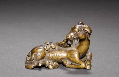 A small bronze scroll weight of a goat. Ming Dynasty