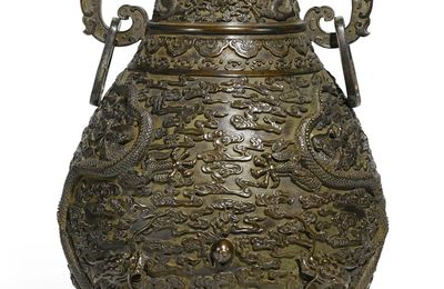 A rare and finely cast imperial bronze 'dragon' vase, Qianlong mark and period (1736-1795)