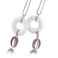 Glossy white onyx whorls with 18-karat pink gold and violet amethysts pendant by Al Coro 