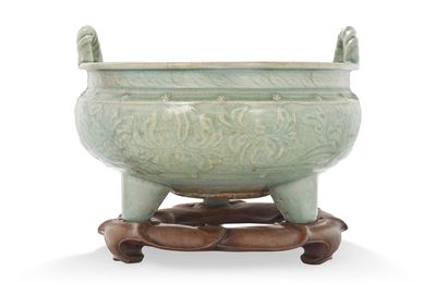 A large carved Longquan celadon tripod censer, Ming dynasty (1368-1644)