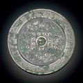 A silvery bronze 'TLV' circular mirror, Western Han dynasty (206 BC-AD 8) 