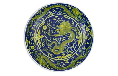 A blue-ground yellow-enameled 'dragon' dish, Seal mark and period of Jiaqing (1796-1820)