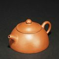 Ji Wan: A Yixing red clay "Orange Peel" teapot