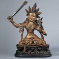 Lacquered gesso figure of the bodhisattva Manjushri. Tibeto-Chinese, late 17th or early 18th century. 