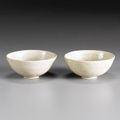 A pair of Ding molded bowls. Song Dynasty