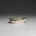 A small oval silver cup with ring handle, Tang dynasty (618-907)