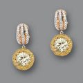 A pair of brilliant-cut fancy yellow diamond and diamond earrings