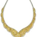 18 Karat white gold, diamond and colored diamond necklace