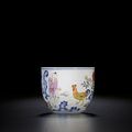 A fine famille-rose 'boy and chicken' cup with imperial poem, fanggu mark and period of Qianlong, dated to bingshen year (1776)