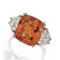 Orange sapphire and diamond ring