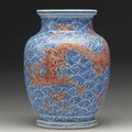 An underglaze blue copper-red cylindrical 'Dragon' vase, Qing Dynasty, 18th century