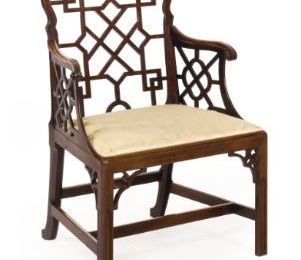 A Rare Pair of George III Carved Mahogany 'Chinese' Arm Chairs, circa 1765
