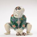 A susancai figure of a young boy, Qing dynasty, Kangxi period (1662-1722)