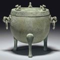A small unusual bronze ritual tripod food vessel and cover, ding, Han dynasty (206 BC-AD 220)