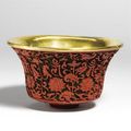 An imperial cinnabar lacquer cup. Qianlong