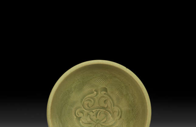 A small carved Yaozhou celadon bowl, Northern Song-Jin dynasty, 11th-12th century