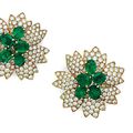 A pair of diamond and emerald ear clips, by Van Cleef & Arpels 