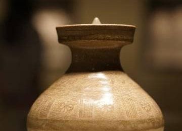 Celadon spittoon with stamped design, Southern Dynasties (420-589)