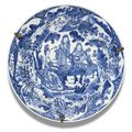 An blue and white 'Musicians' dish, Qing dynasty, Kangxi period (1662-1722)