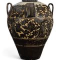 An extremely large and important 'lingwu' cut-glaze wine jar, Xixia dynasty (1038-1227)