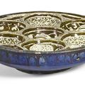A large and rare Kashan lustre sweetmeat pottery dish, Persia, circa 1200