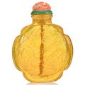 A transparent yellow glass 'chilong and bat' snuff bottle, Qing dynasty, 18th-19th century