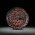 A rare large carved black and red lacquer dish, Ming Dynasty (1368-1644)