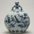 ‘Moon’ flask with birds and flowering branches. Ming dynasty, Yongle period, AD 1403–24