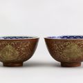 Blue and white bowls with lotus scrolls on red glaze, Ming dynasty, Jiajing reign (1522-1566)