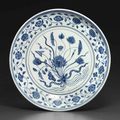 A rare Early Ming blue and white ‘Lotus Bouquet’ dish, Yongle period (1403-1425)