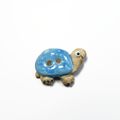 Bouton tortue bleue