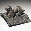 A very rare bronze tiger-form applique, late Eastern Zhou dynasty, 5th-4th century BC