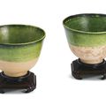 A pair of green-glazed pottery cups, Tang dynasty (618-907)