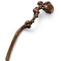 A carved bamboo-root 'peach and bat' ruyi sceptre, Qing dynasty, 18th century