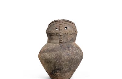 A black pottery owl-form ewer, Qijia culture, c. 2050-1700 BC