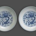 A pair of blue and white dragon-decorated dishes, Daoguang six-character marks and of the period