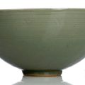 An engraved celadon glazed buddhist emblems bowl, China, Ming-early Qing dynasty 