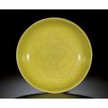 A yellow-glazed 'dragon' dish. Mark and period of Qianlong