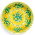 A yellow-ground green-enamelled saucer dish, mark and period of Jiajing