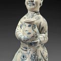 A very rare blue and white kneeling figure of an official, Vietnam, 15th-16th century
