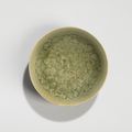 A Yaozhou celadon moulded 'Peony' bowl, Jin dynasty (1115-1234)
