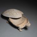  A tortoise-shaped pottery ink-stone and cover, Han Dynasty (206 BC-220 AD)