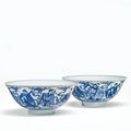 A pair of blue and white 'Eight Immortal' bowls, Qianlong six-character seal mark in underglaze blue and of the period