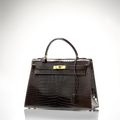 Hermès Paris made in france. Sac Kelly 32 cm en crocodile porosus marron. Année: 1973